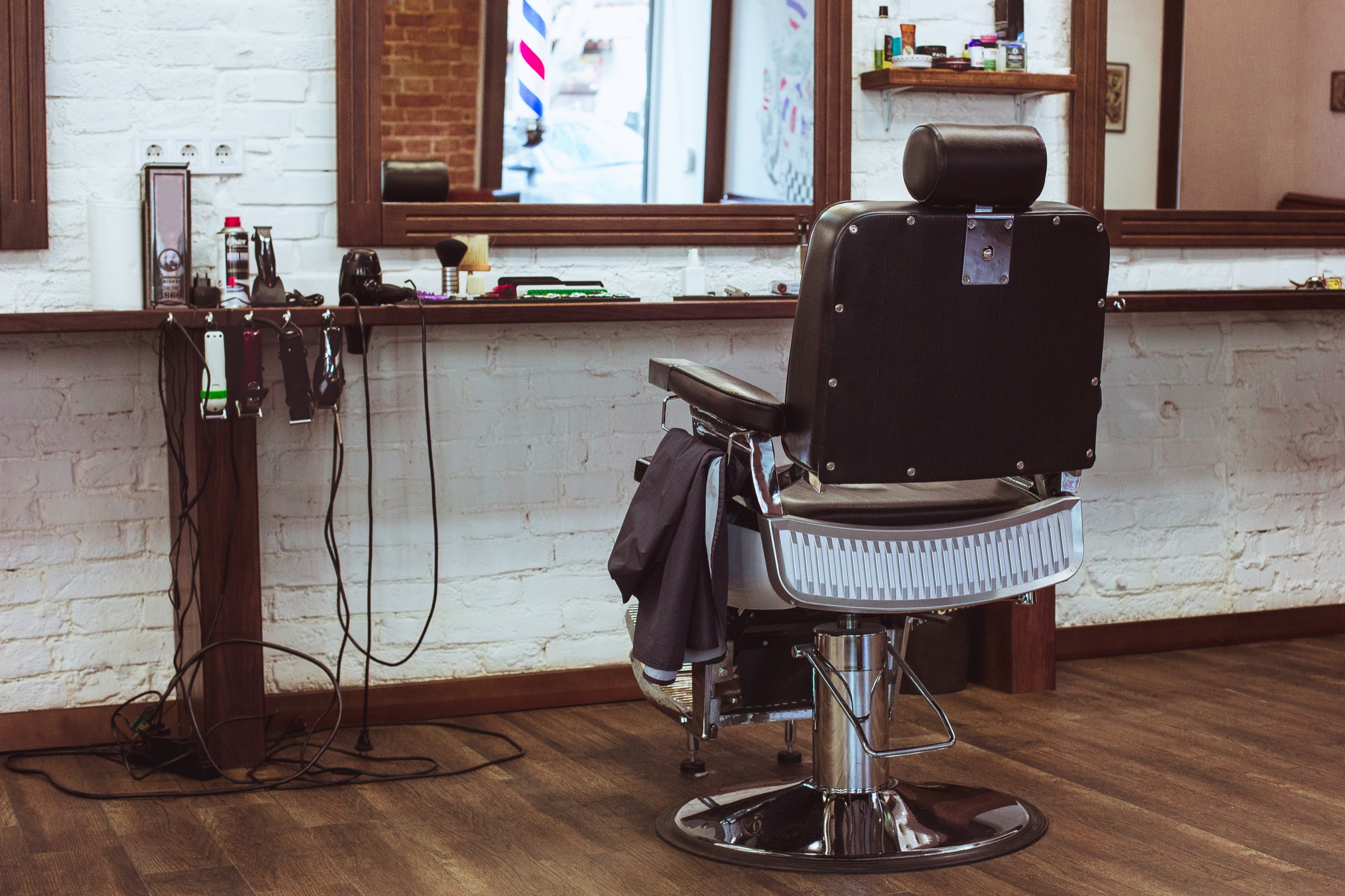 Vintage chair and interior in stilish barbershop